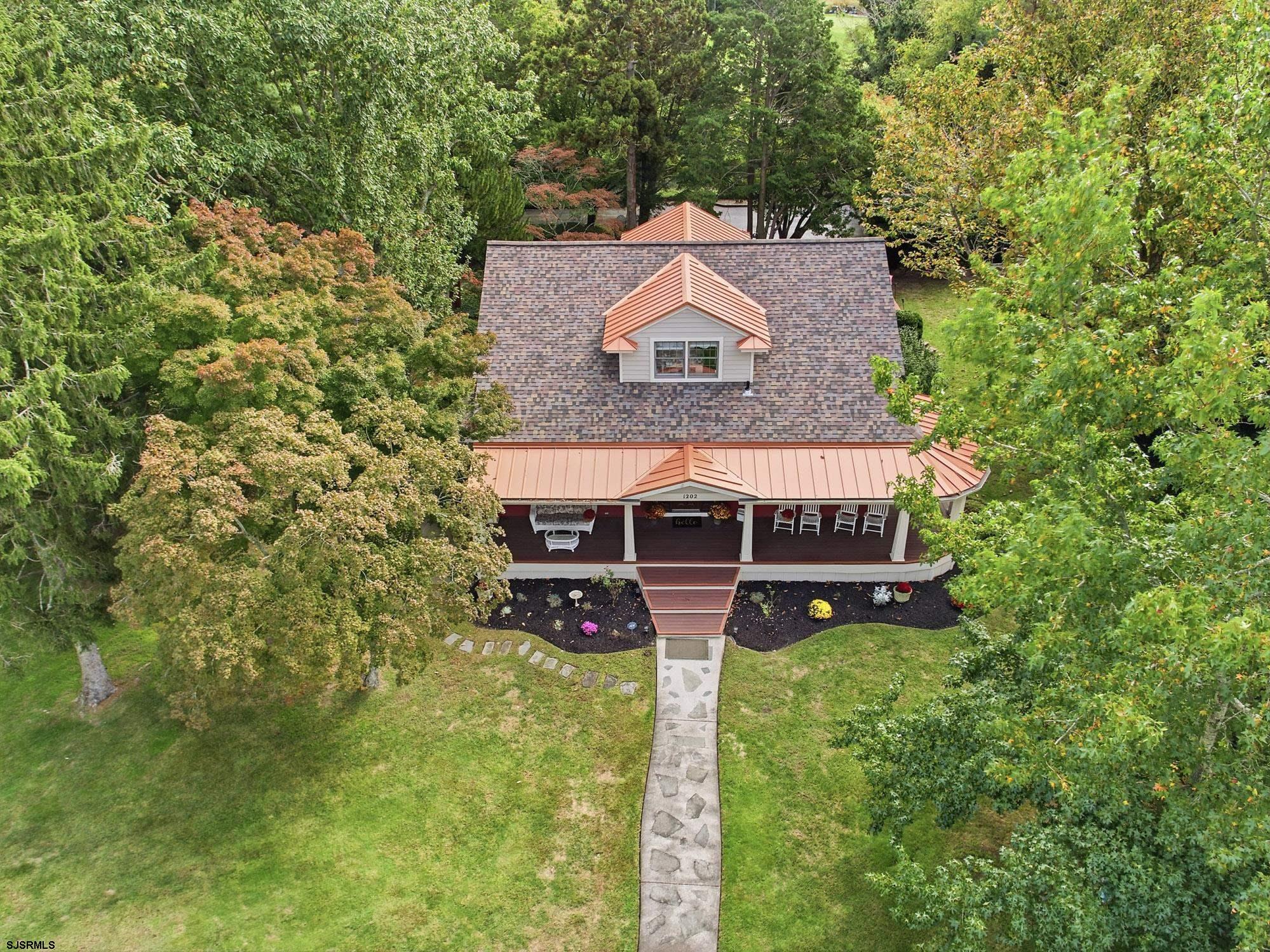 1202 Shore Road Northfield, NJ 08225 - Photo 50 of 57 an aerial view of a house with swimming pool garden and patio