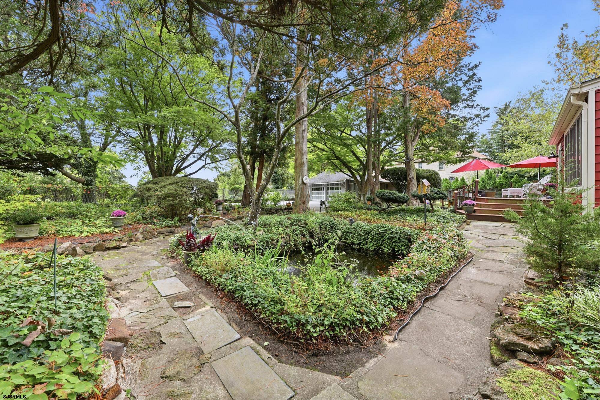 1202 Shore Road Northfield, NJ 08225 - Photo 5 of 57 a view of a pathway with a yard