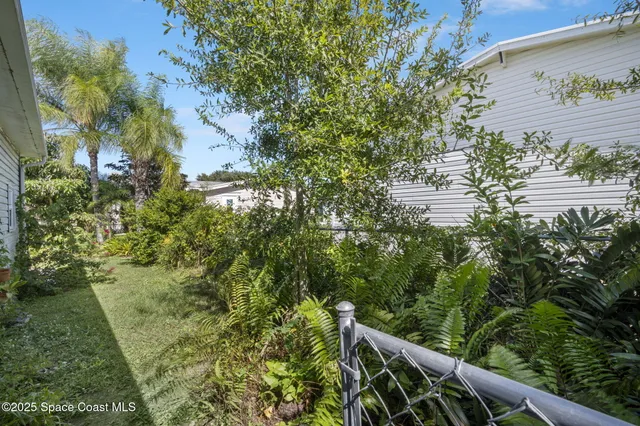 a balcony with trees in front of it