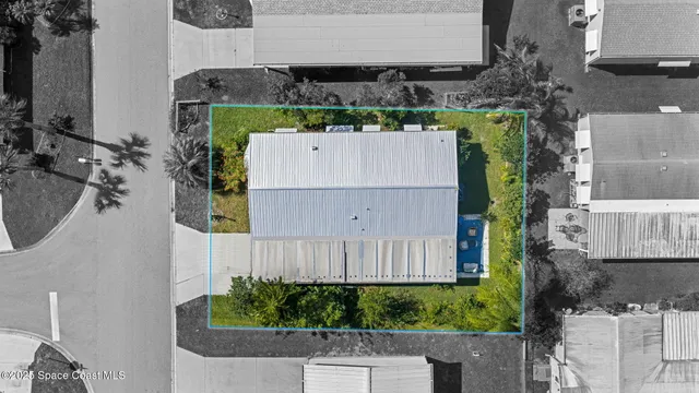 a bird view of house with outdoor space