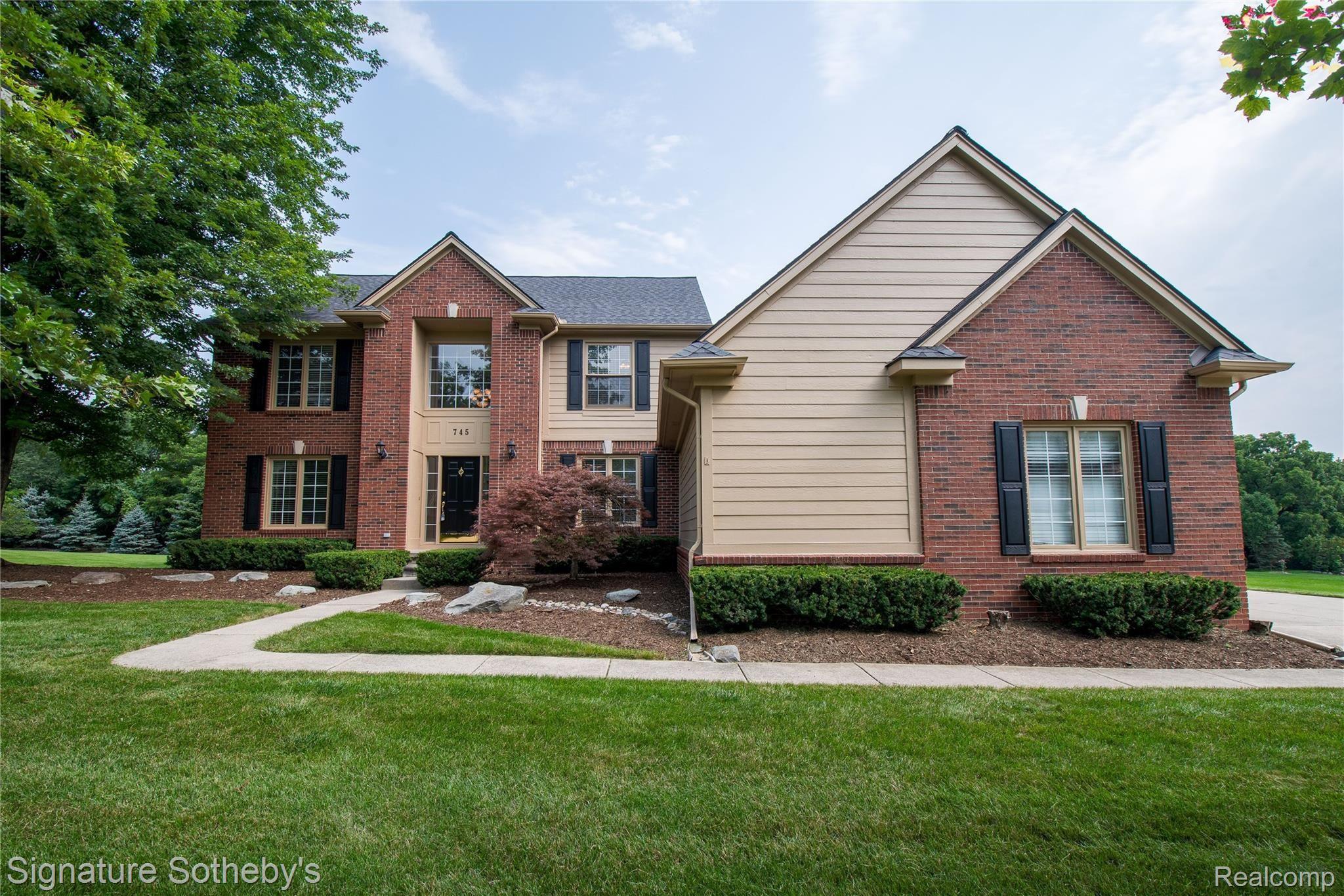 745 West Ridge Court Lake Orion, MI 48359 - Photo 1 of 44 Custom home updated throughout