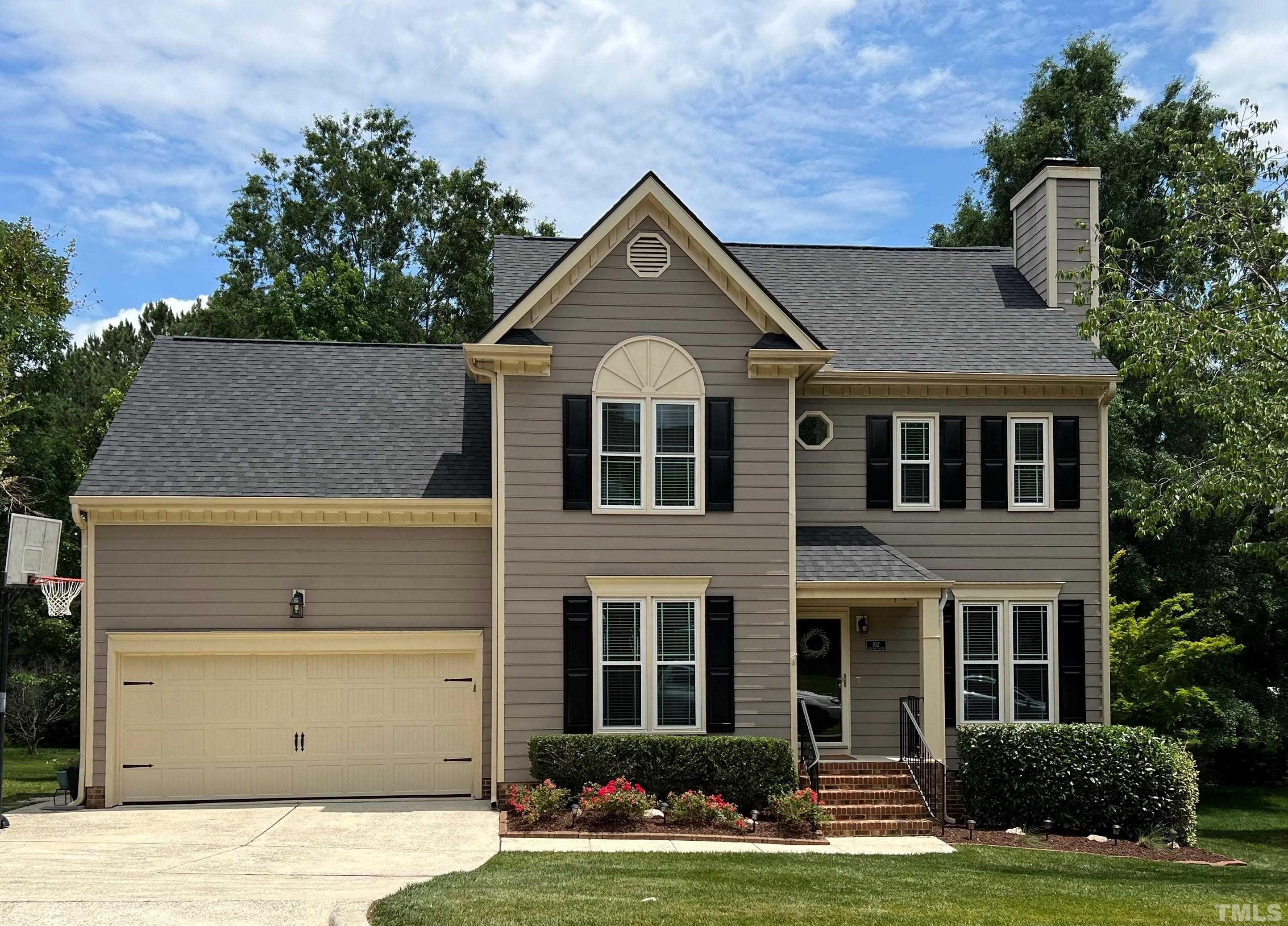 102 Sequoia Court Cary, NC 27513 - Photo 1 of 36 a front view of a house with garden
