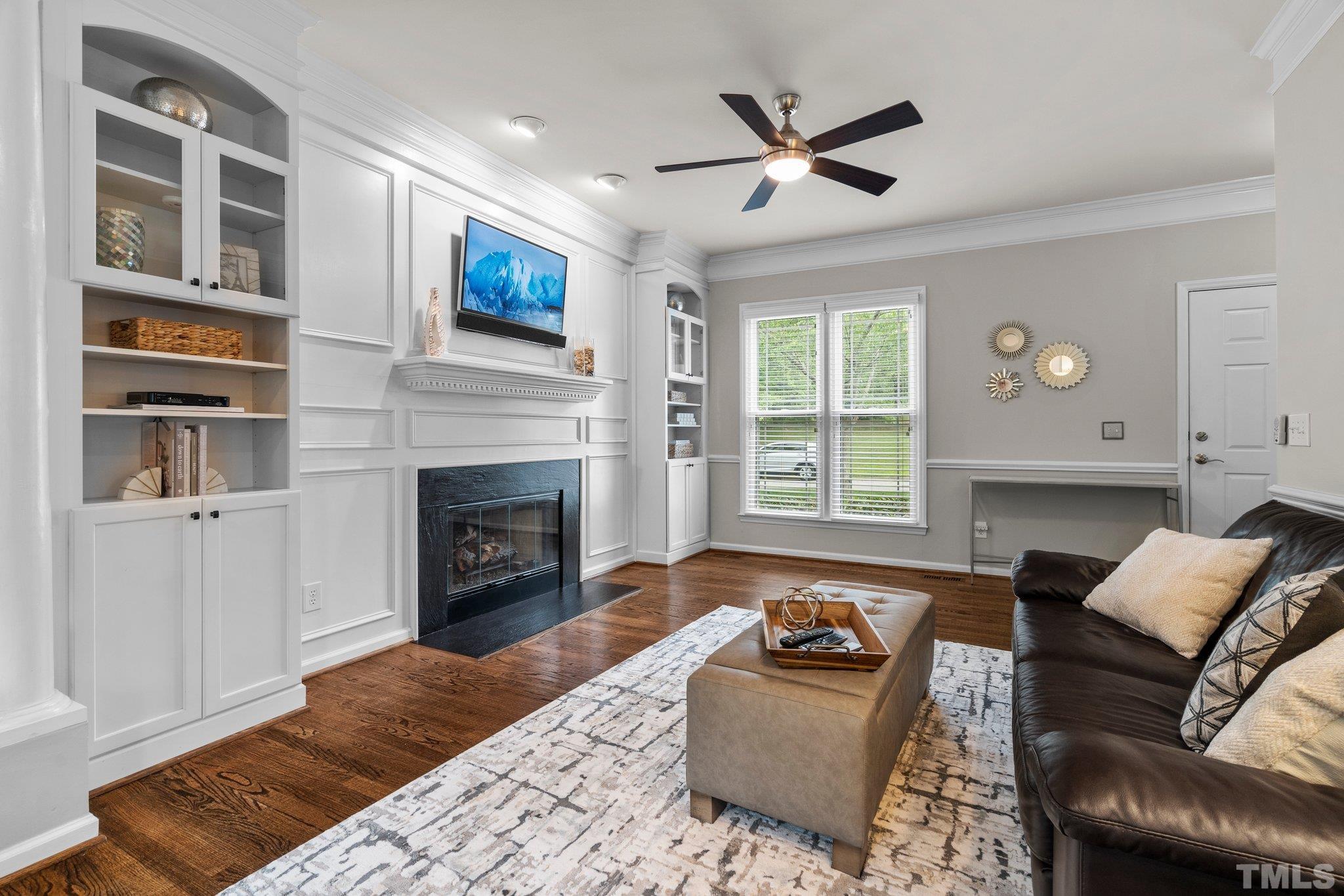 102 Sequoia Court Cary, NC 27513 - Photo 20 of 36 a living room with furniture a window and a fireplace