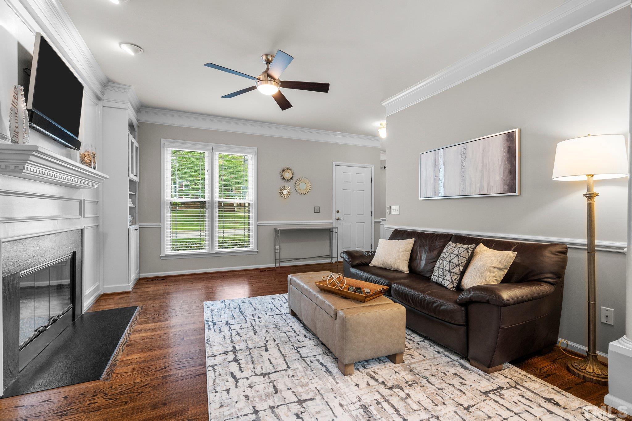 102 Sequoia Court Cary, NC 27513 - Photo 21 of 36 a living room with furniture and a fireplace