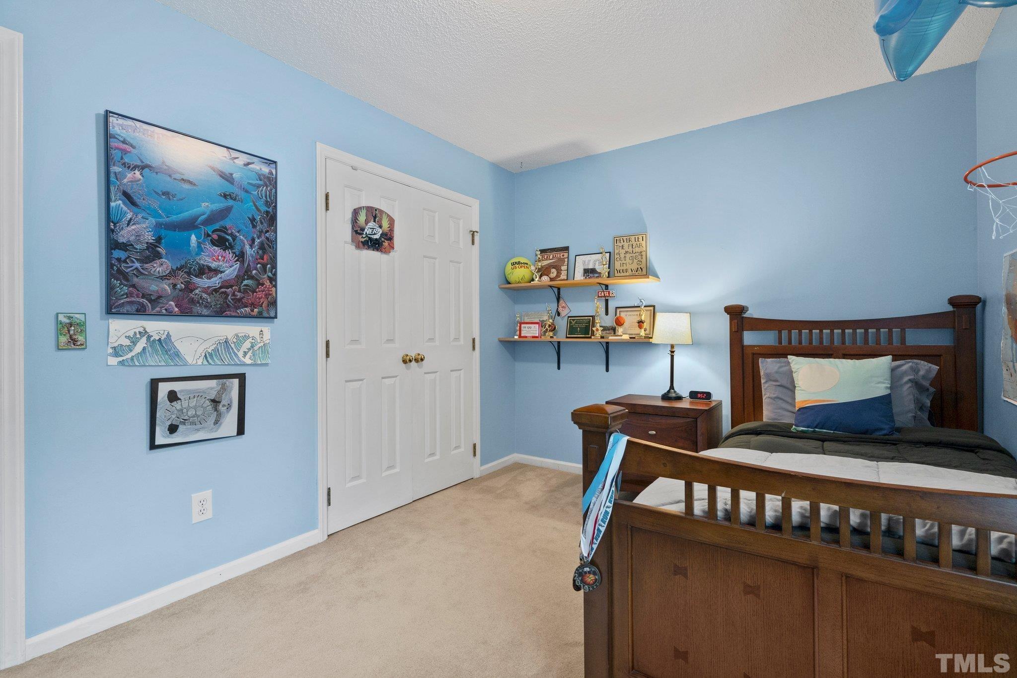 102 Sequoia Court Cary, NC 27513 - Photo 26 of 36 a bedroom with furniture and baby bed