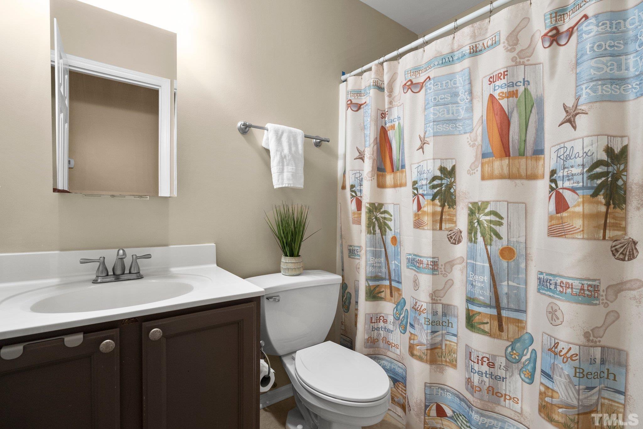 102 Sequoia Court Cary, NC 27513 - Photo 27 of 36 a bathroom with a sink toilet and shower