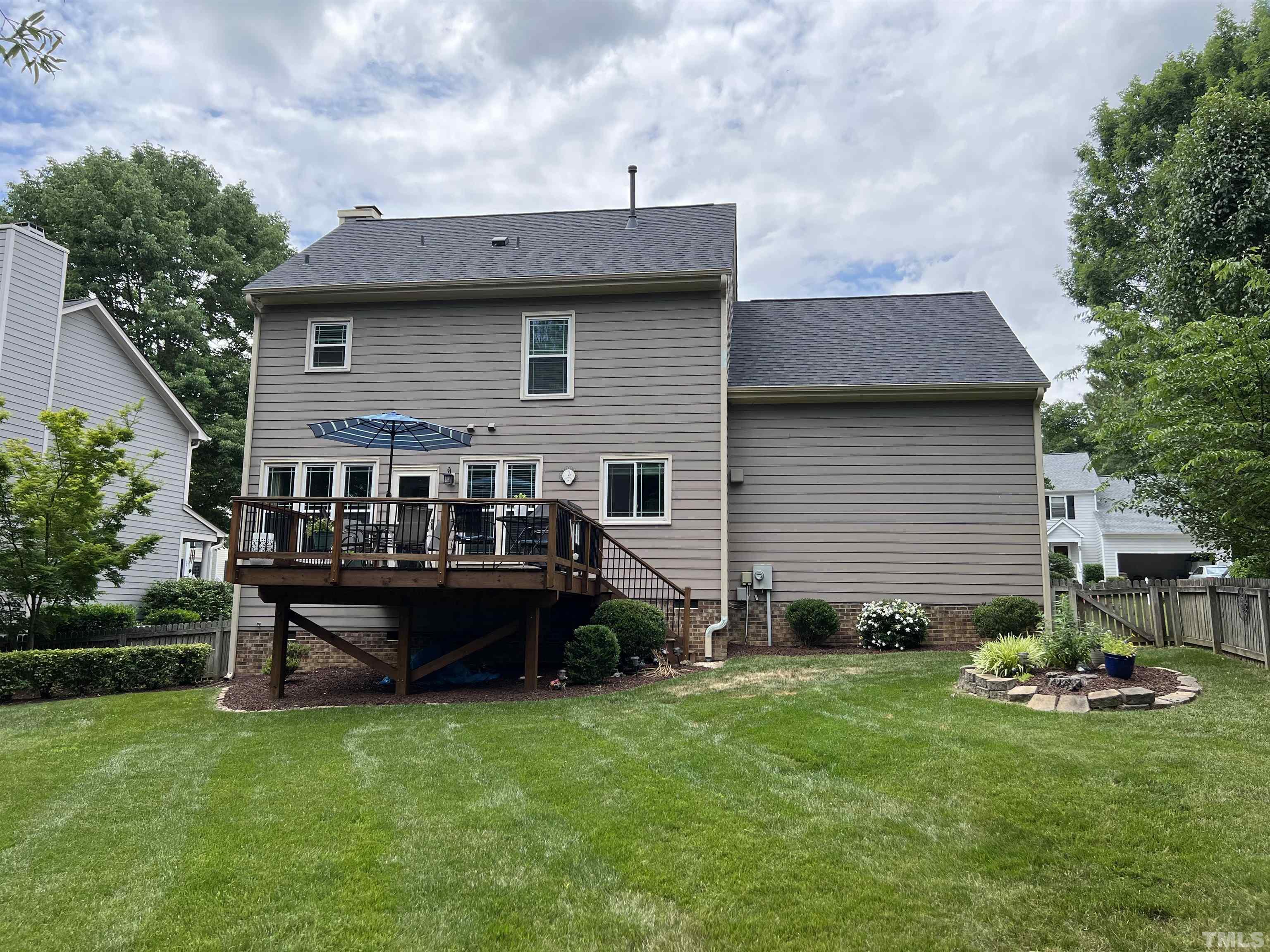 102 Sequoia Court Cary, NC 27513 - Photo 3 of 36 a view of a house with backyard and sitting area