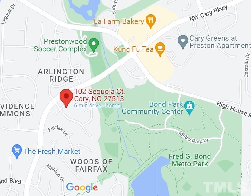 102 Sequoia Court Cary, NC 27513 - Photo 5 of 36 a sign that is sitting on a white table