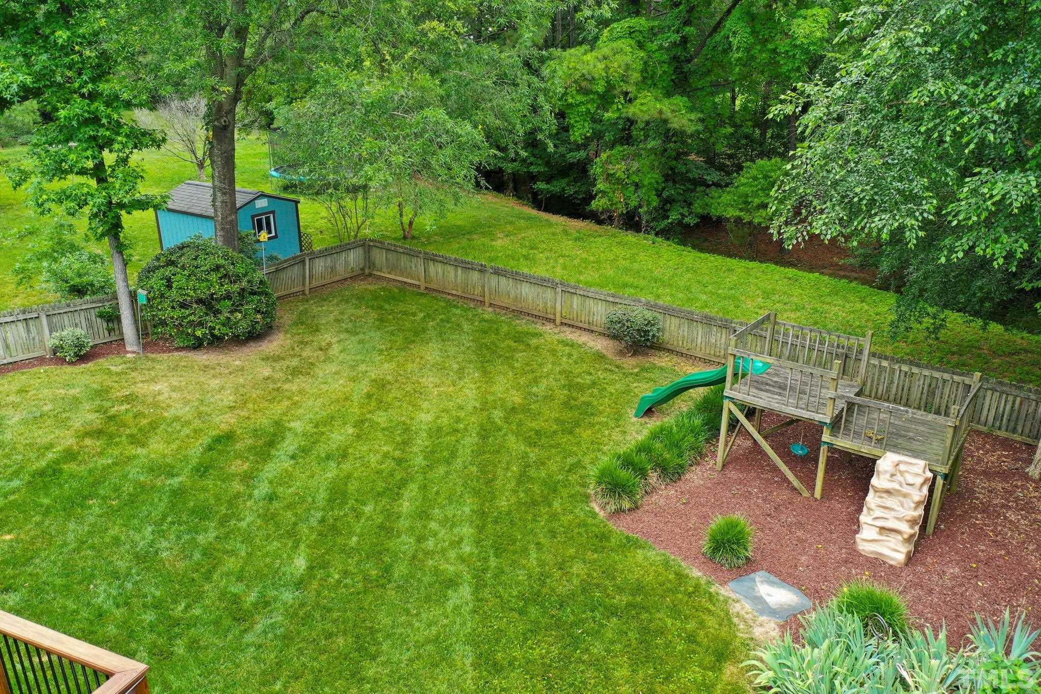 102 Sequoia Court Cary, NC 27513 - Photo 10 of 36 a view of a backyard