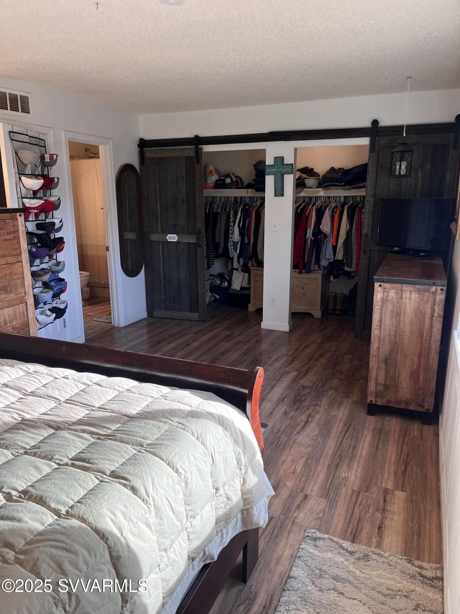 3405 South Silver Road Camp Verde, AZ 86322 - Photo 24 of 56 a bed room with a bed and a closet