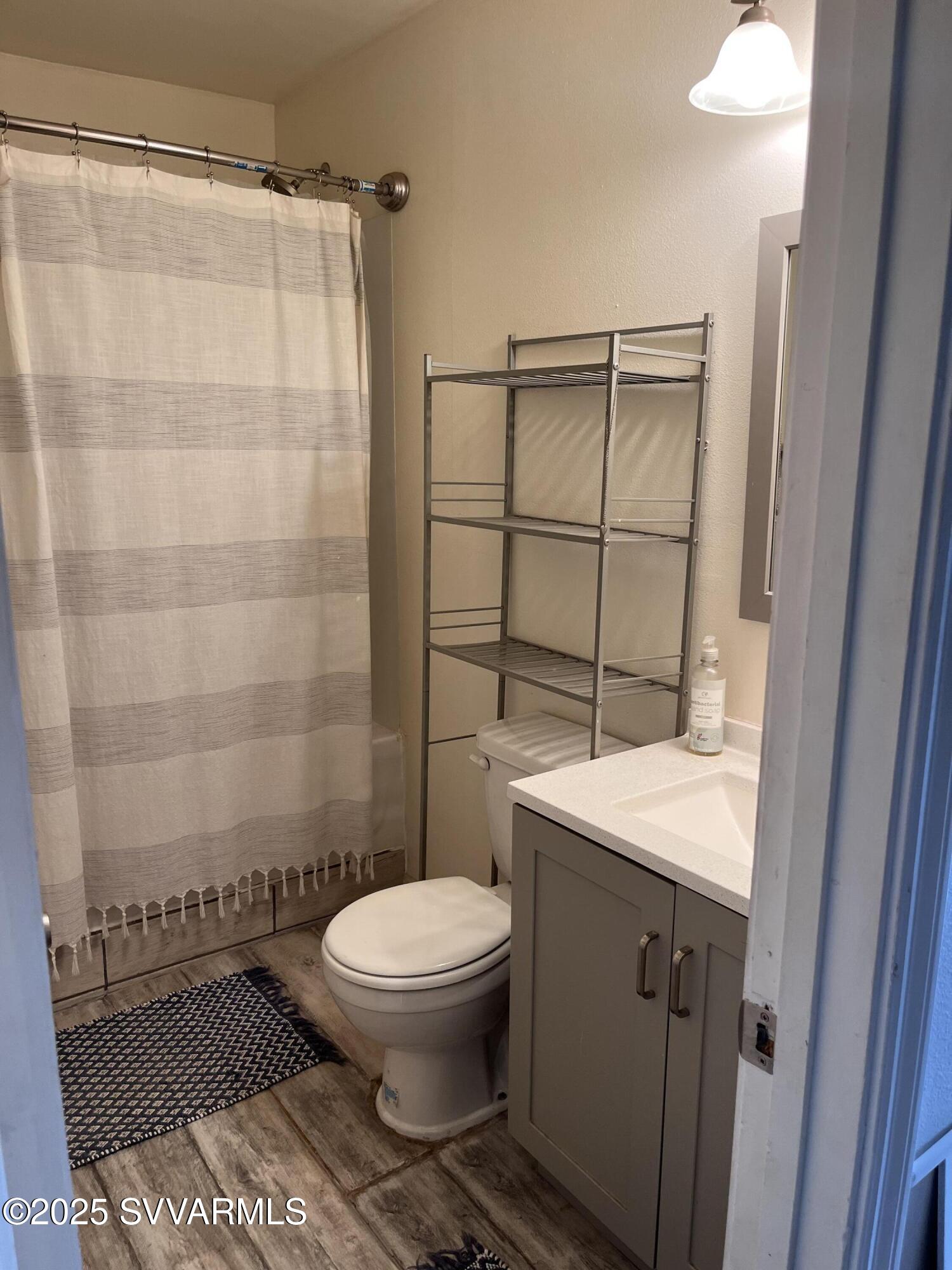 3405 South Silver Road Camp Verde, AZ 86322 - Photo 30 of 56 a bathroom with a toilet a sink and a shower