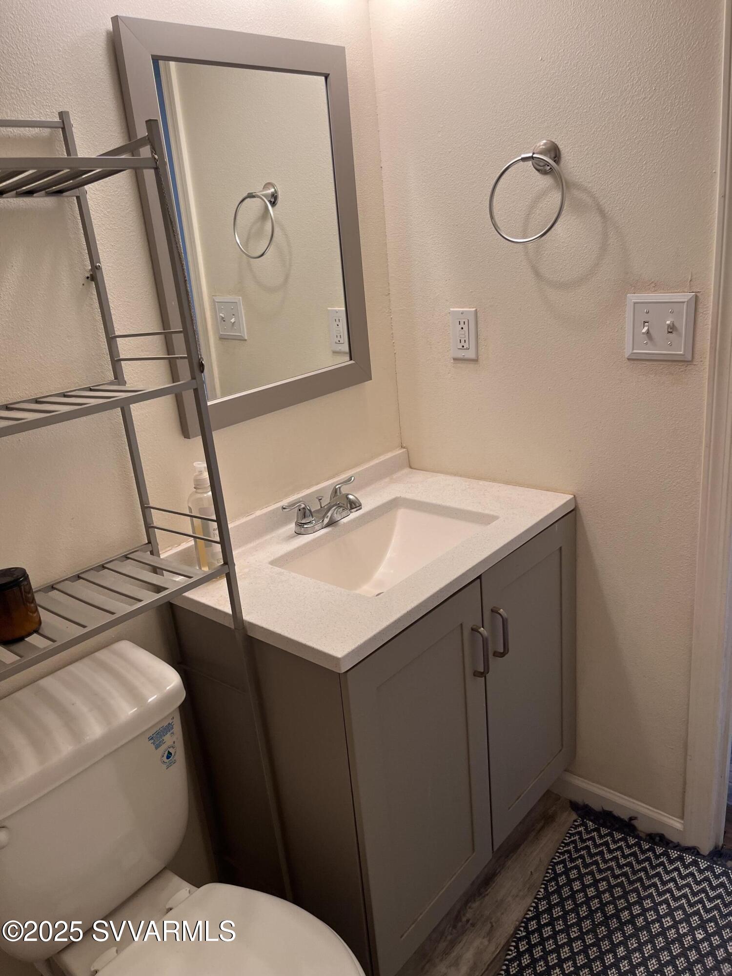 3405 South Silver Road Camp Verde, AZ 86322 - Photo 31 of 56 a bathroom with a sink and a mirror