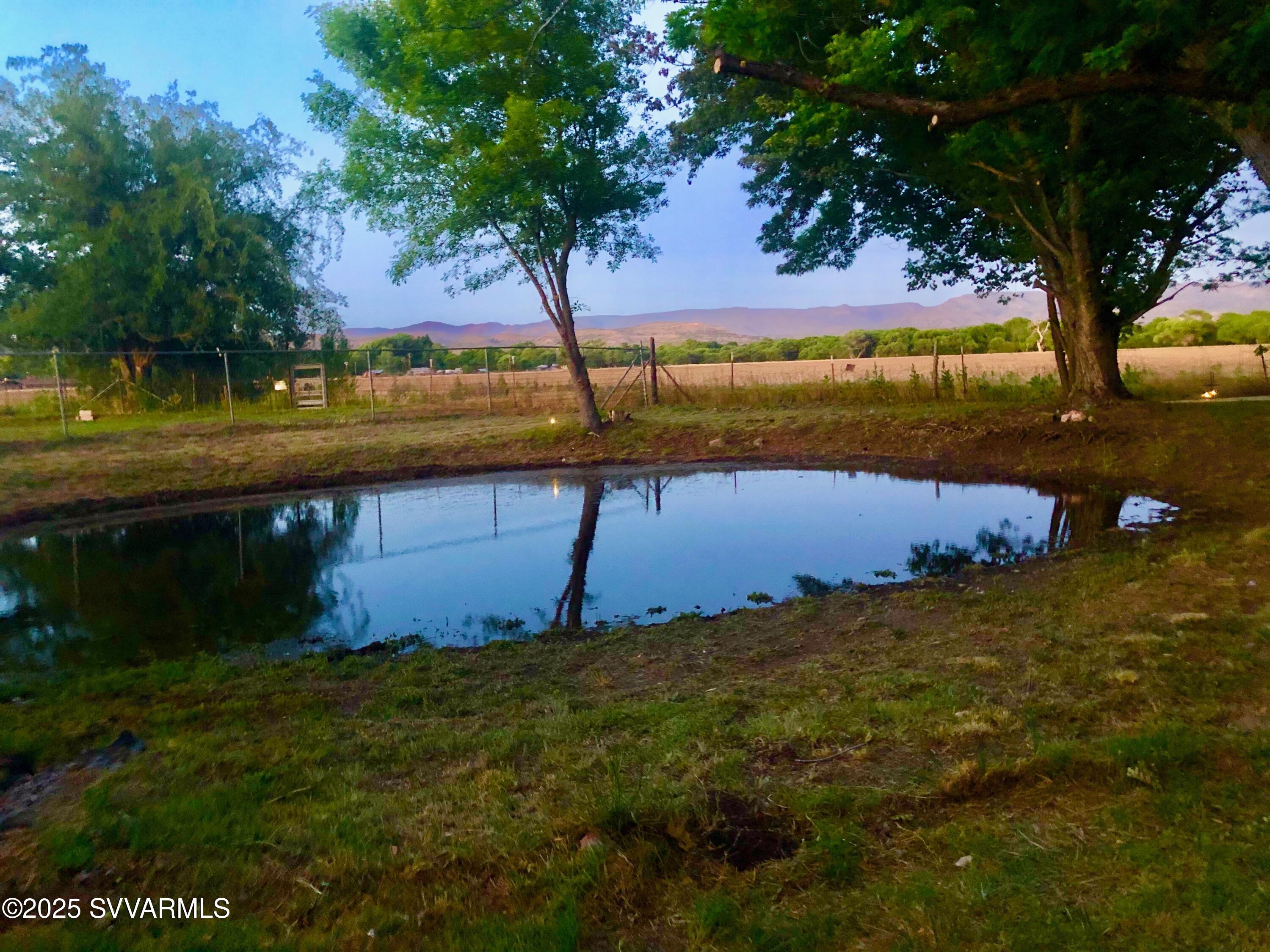 3405 South Silver Road Camp Verde, AZ 86322 - Photo 43 of 56 a view of a lake with a yard