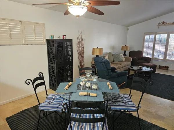 a view of a dining room with furniture