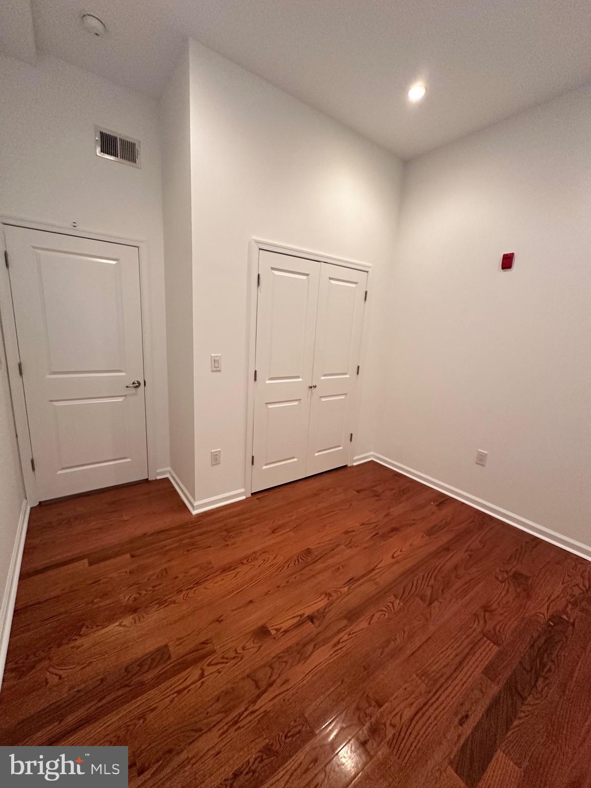 1128 South 19th Street, Unit A Philadelphia, PA 19146 - Photo 11 of 17 wooden floor in an empty room