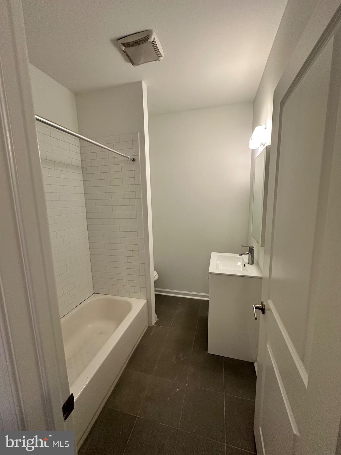 1128 South 19th Street, Unit A Philadelphia, PA 19146 - Photo 13 of 17 a bathroom with a bath tub