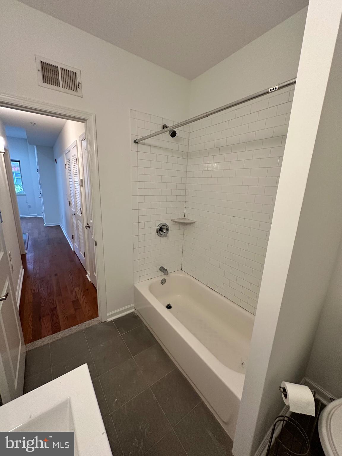 1128 South 19th Street, Unit A Philadelphia, PA 19146 - Photo 14 of 17 a bathroom with a bathtub and a shower