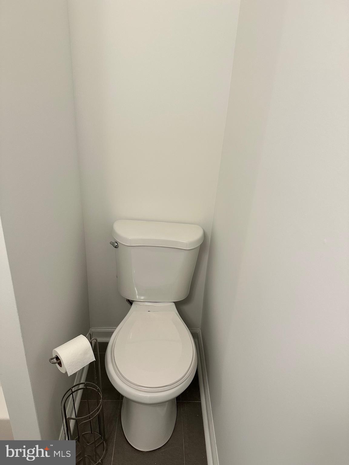 1128 South 19th Street, Unit A Philadelphia, PA 19146 - Photo 15 of 17 a white toilet sitting next to a white wall