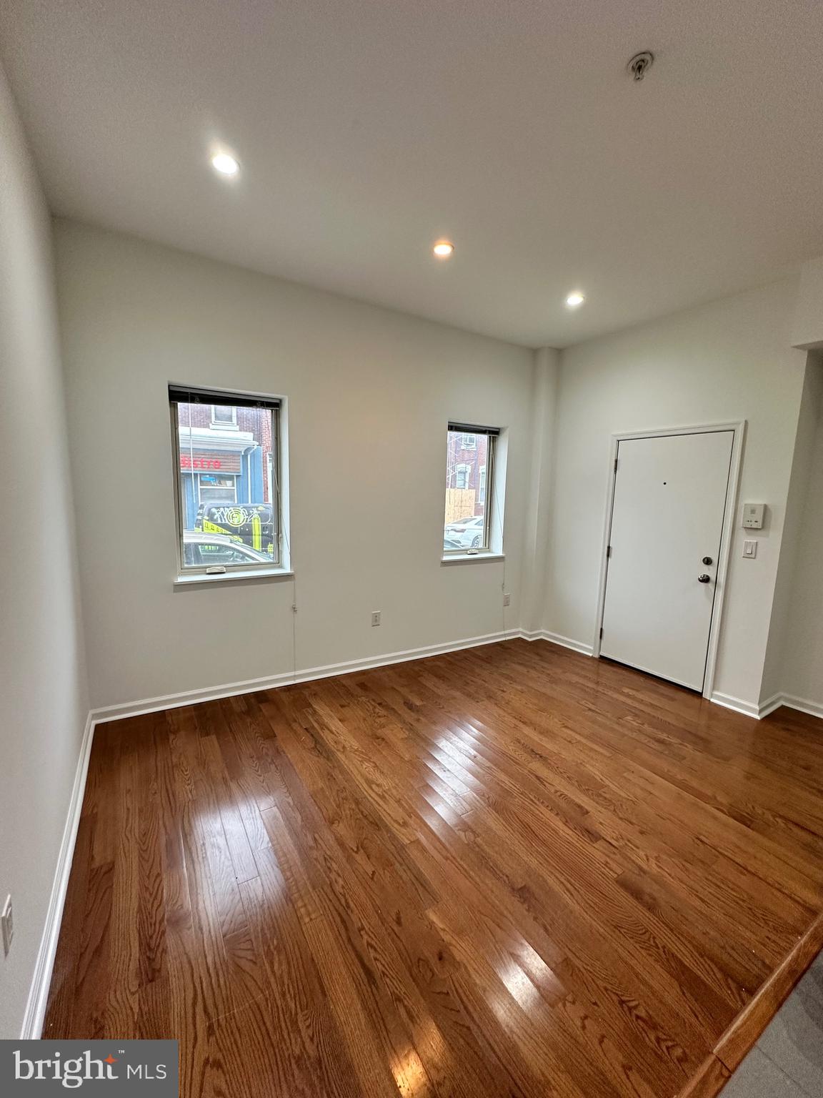 1128 South 19th Street, Unit A Philadelphia, PA 19146 - Photo 7 of 17 a view of an empty room and wooden floor