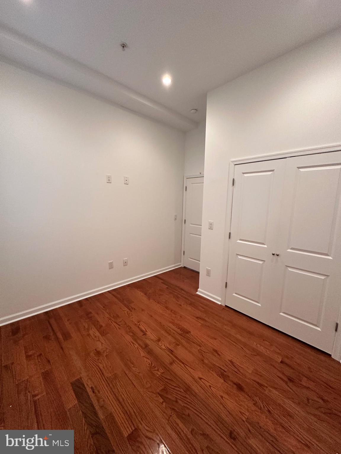 1128 South 19th Street, Unit A Philadelphia, PA 19146 - Photo 10 of 17 wooden floor in an empty room