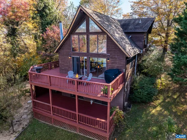 a view of a patio with wooden floor