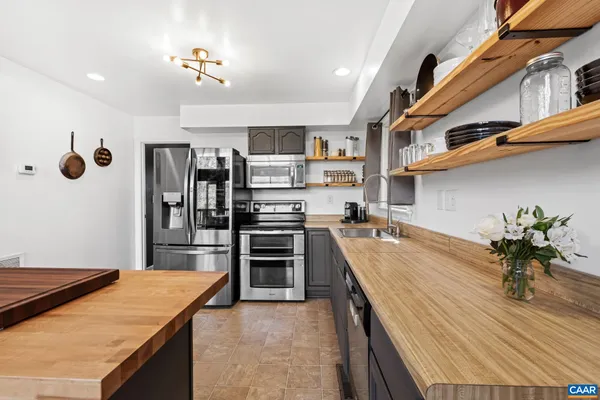 a view of livingroom with washer and dryer