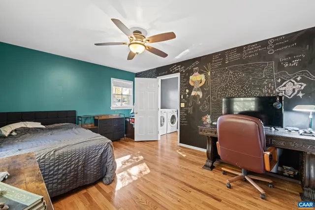 a view of staircase with railing and stairs