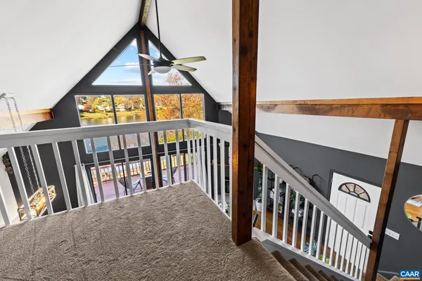 a large white bed in a white room