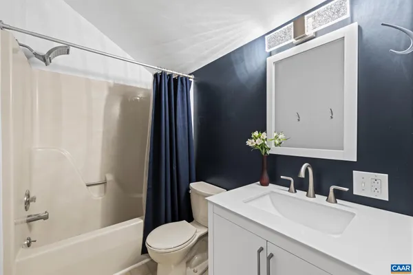 a view of a chairs and table on the wooden floor
