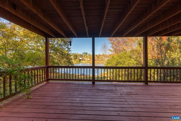 a view of a backyard with sitting area and furniture