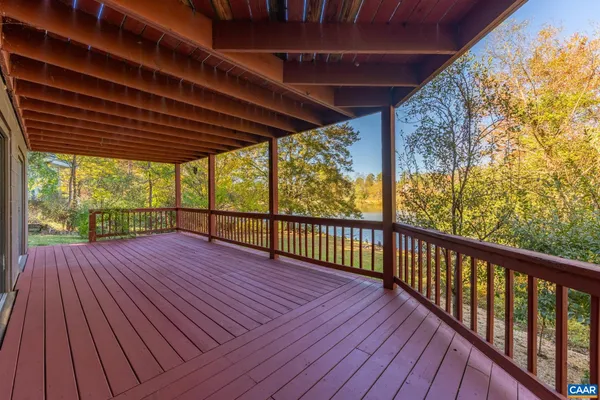 a view of a backyard with sitting area