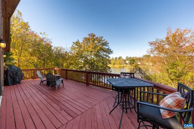 a view of a house with roof deck front of house