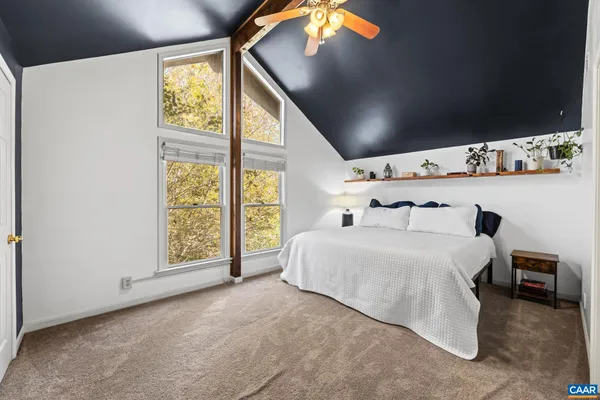 a view of a chair and table in the balcony