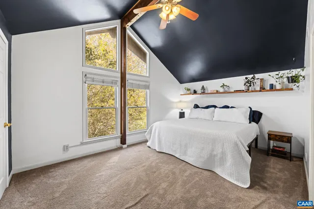 a view of a chair and table in the balcony