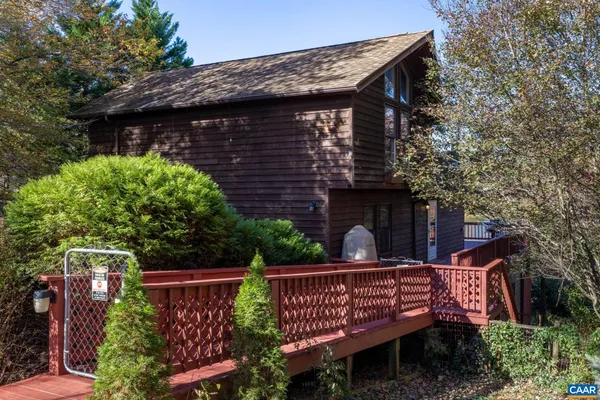 a view of balcony with wooden floor