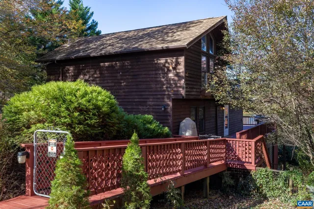 a view of balcony with wooden floor