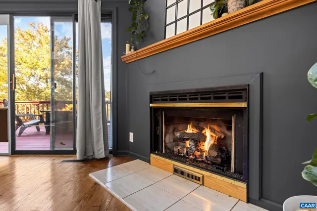 a view of a balcony with wooden floor
