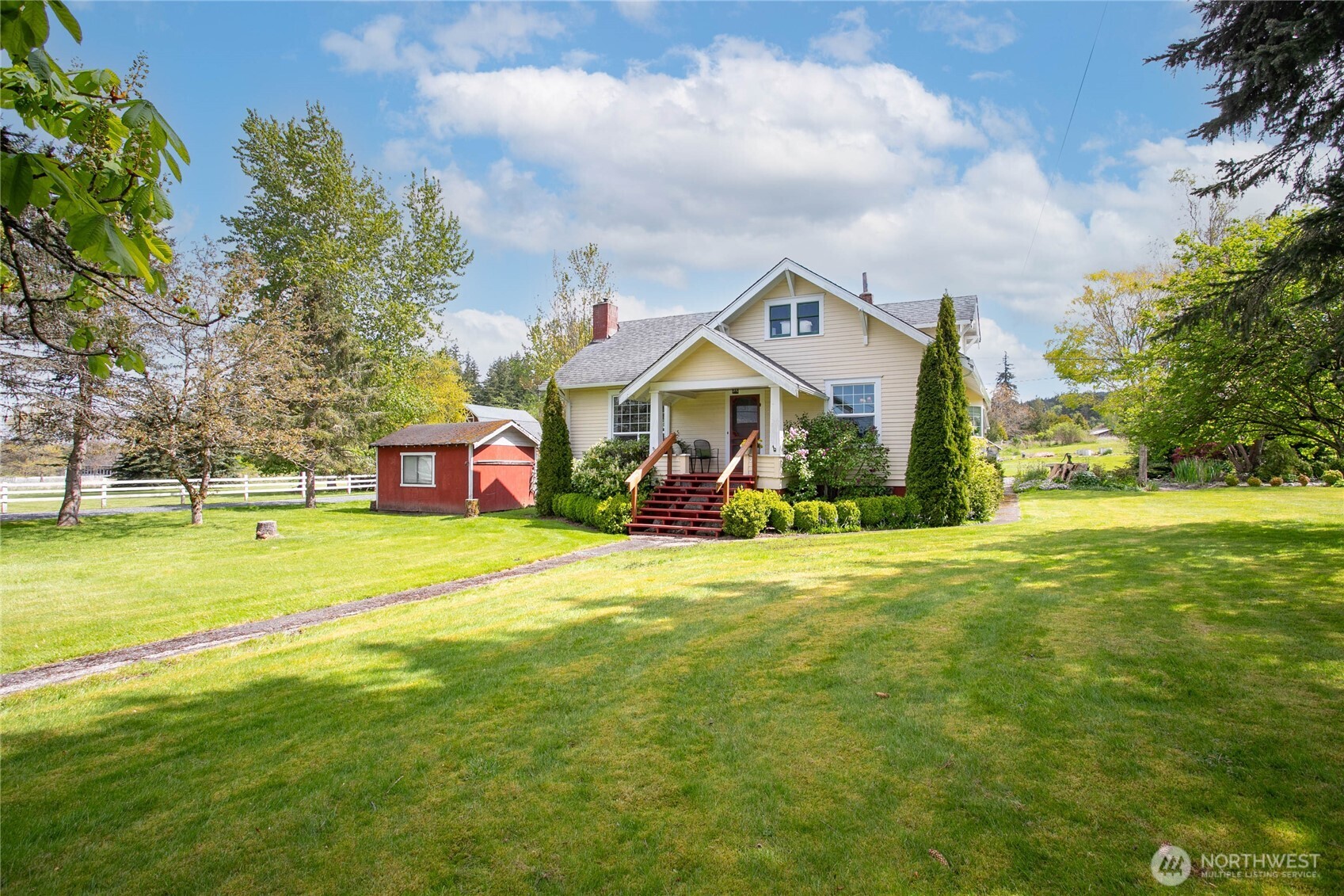 4918 Sand Road Bellingham, WA 98226 - Photo 1 of 39 a front view of house with outdoor space and garden