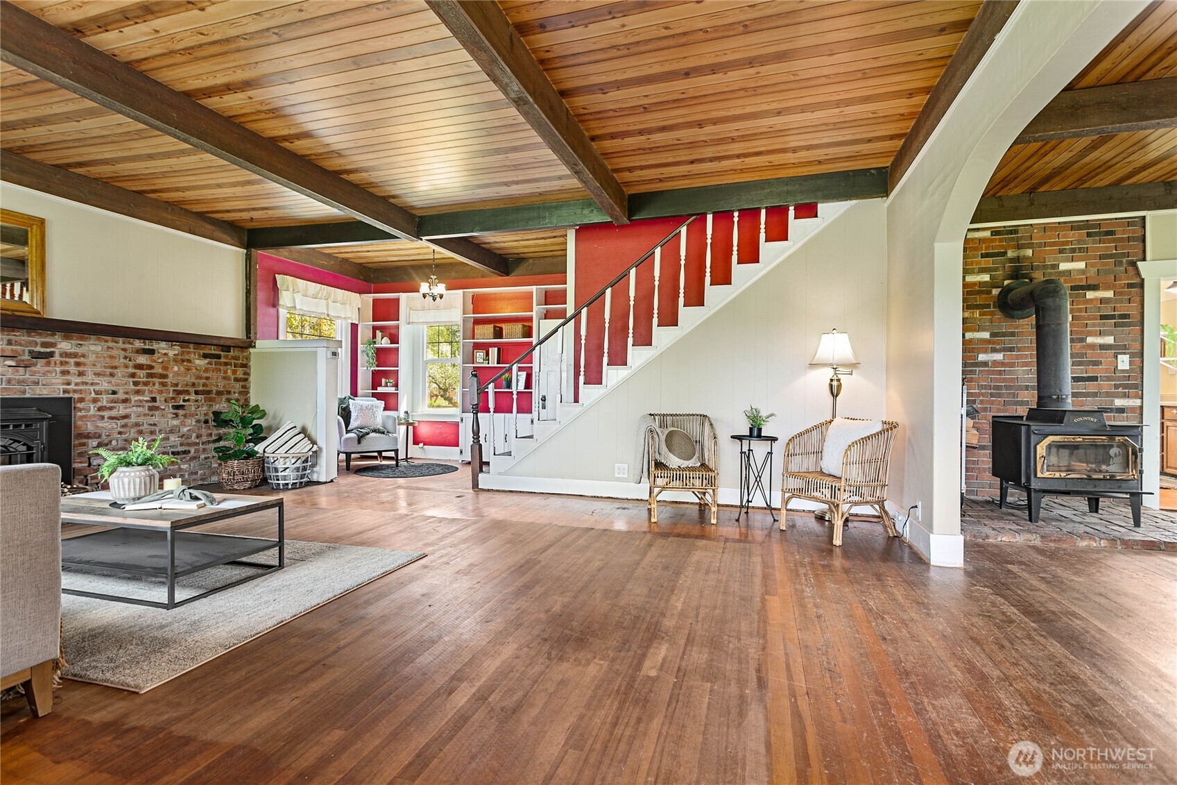 4918 Sand Road Bellingham, WA 98226 - Photo 2 of 39 a living room filled with furniture and a wooden floor