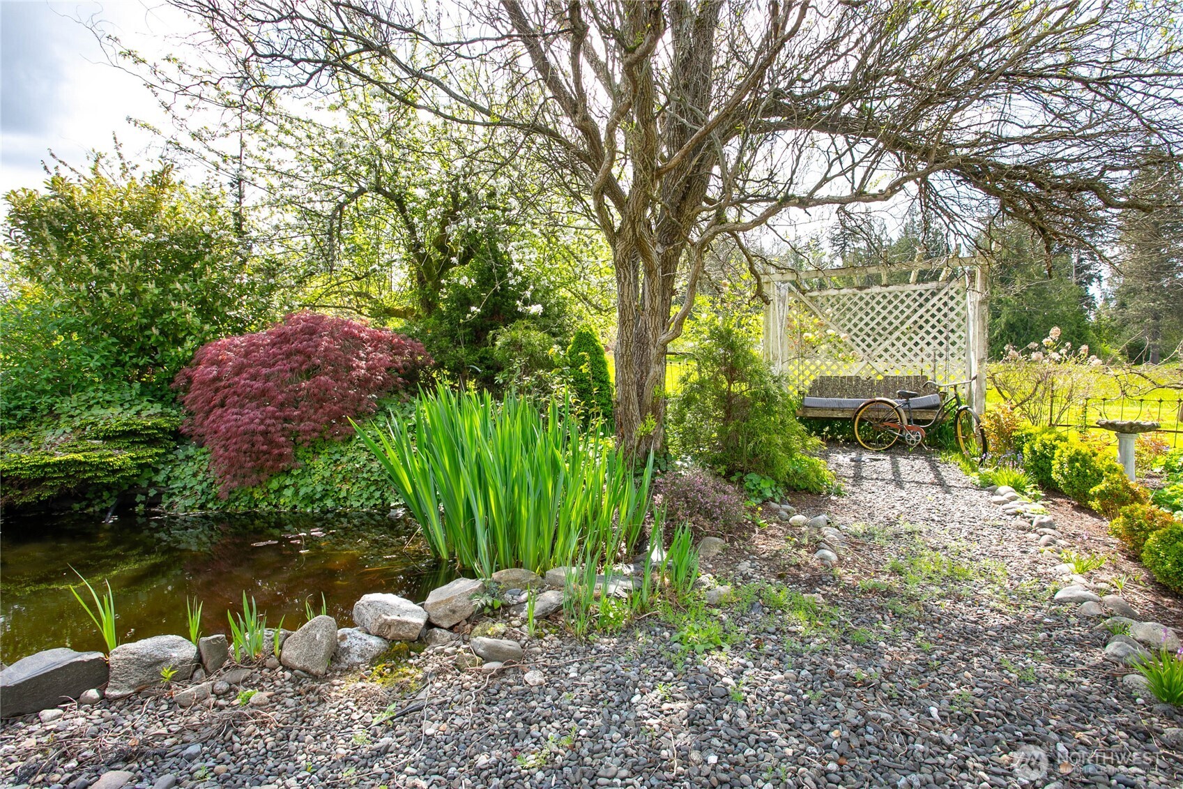 4918 Sand Road Bellingham, WA 98226 - Photo 23 of 39 a backyard of a house with lots of green space