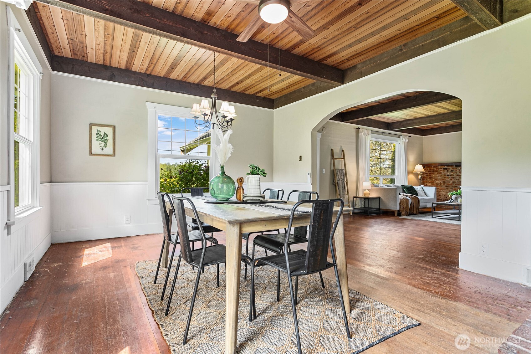 4918 Sand Road Bellingham, WA 98226 - Photo 8 of 39 a view of a dining room with furniture and wooden floor