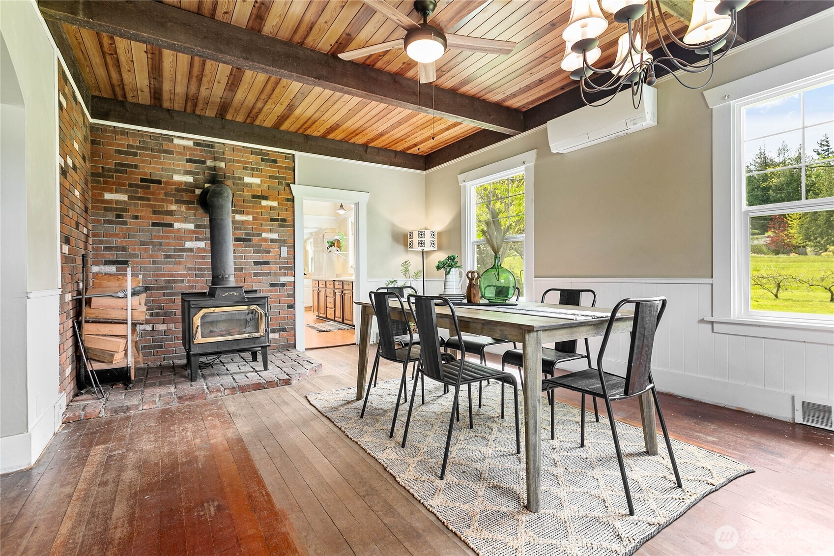 4918 Sand Road Bellingham, WA 98226 - Photo 9 of 39 a dining room with furniture and wooden floor