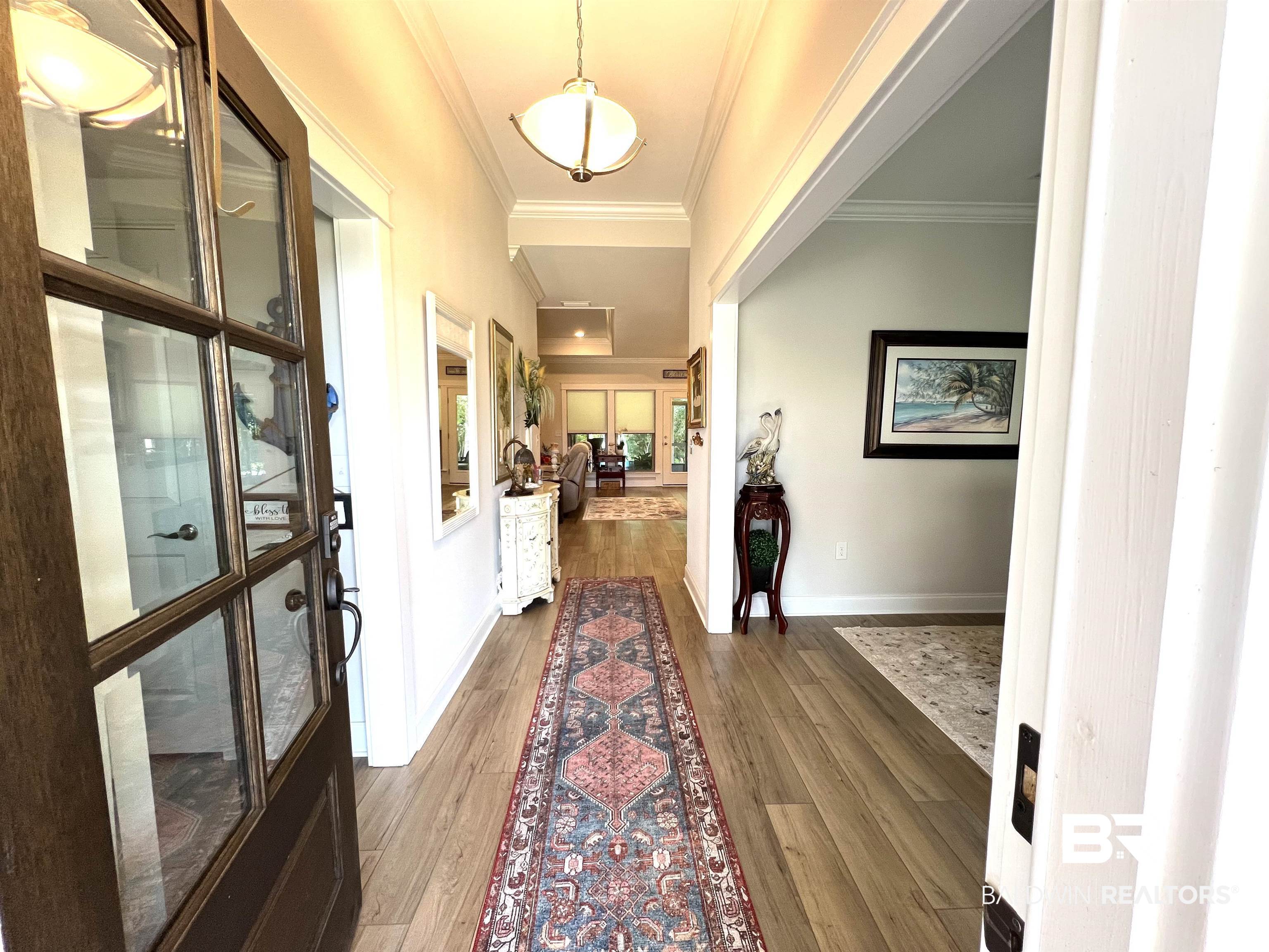 1653 Hudson Road Foley, AL 36535 - Photo 4 of 31 Entryway featuring dark hardwood / wood-style flooring and ornamental molding