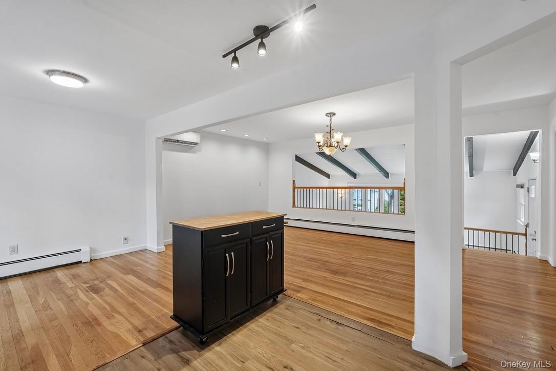 82 Stephens Road Tappan, NY 10983 - Photo 12 of 42 Movable island with view of dining area and living room,