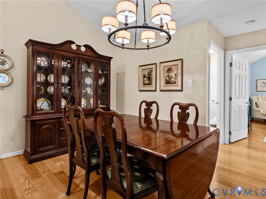 1338 Tannery Circle Midlothian, VA 23113 - Photo 16 of 37 a view of a dining room and hall with furniture