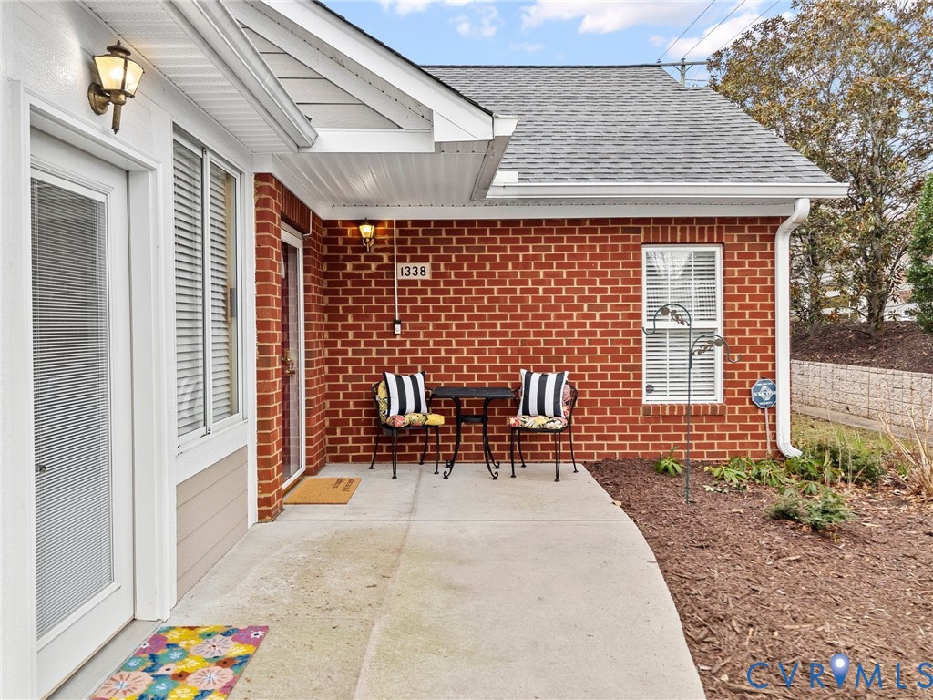 1338 Tannery Circle Midlothian, VA 23113 - Photo 2 of 37 a backyard of a house with outdoor seating