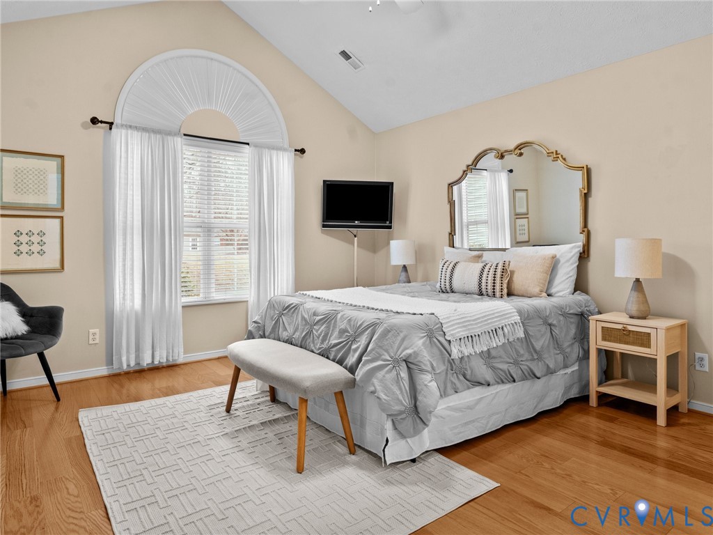 1338 Tannery Circle Midlothian, VA 23113 - Photo 23 of 37 a bedroom with a bed and a couch