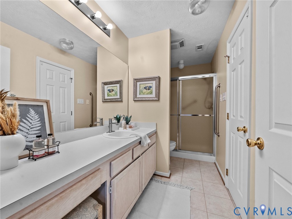 1338 Tannery Circle Midlothian, VA 23113 - Photo 27 of 37 a bathroom with a sink double vanity