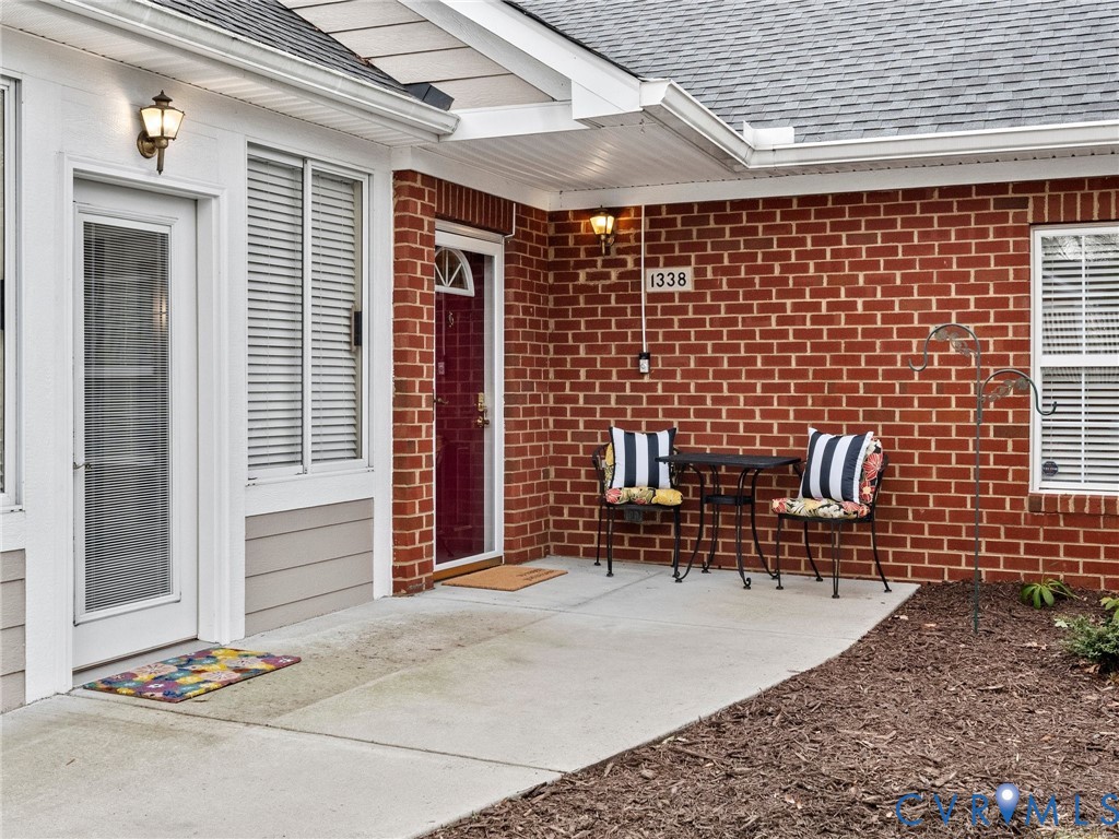 1338 Tannery Circle Midlothian, VA 23113 - Photo 3 of 37 a patio with table and chairs