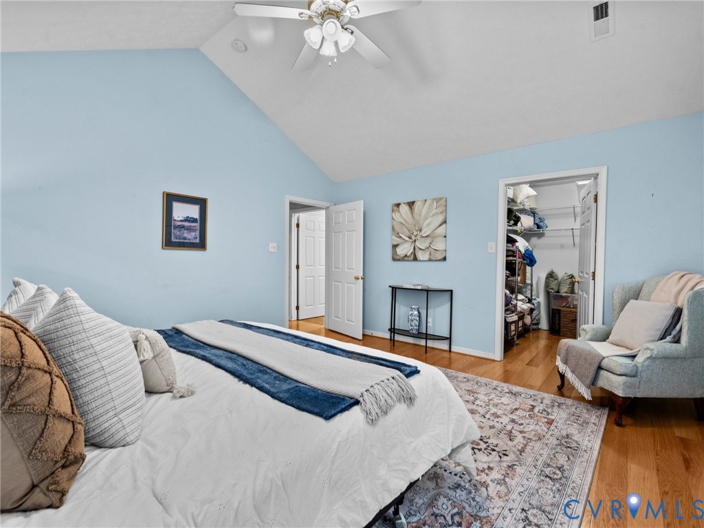 1338 Tannery Circle Midlothian, VA 23113 - Photo 31 of 37 a bedroom with a bed and wooden floor